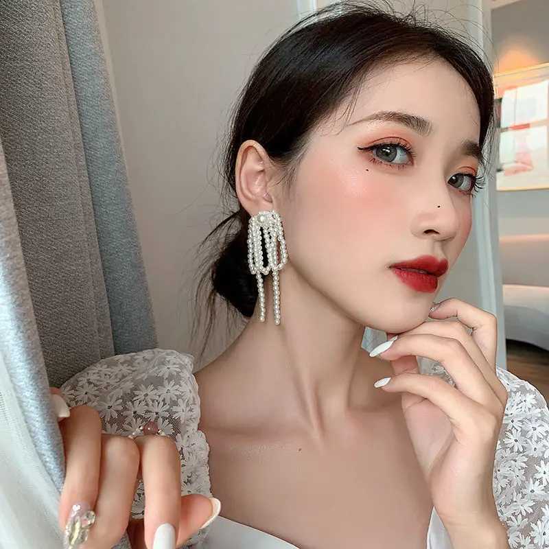 2024 Korean bow tassel earrings imitation pearl bead bow long earrings womens wedding fashion temperature jewelry gifts W241023