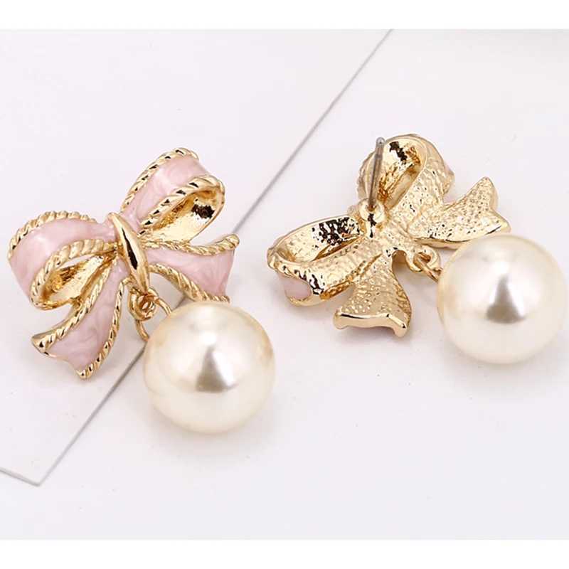 Hot Fashion Cute Pink Bow Earrings Imitation Pearl Earrings Upscale Wedding Womens Party Jewelry Gifts New E8972019 W241023