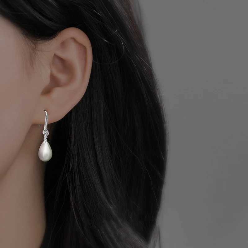 Simple and elegant droplet simulated pearl pendant earrings suitable for womens engagements weddings parties fashionable jewelry earrings gifts W24102