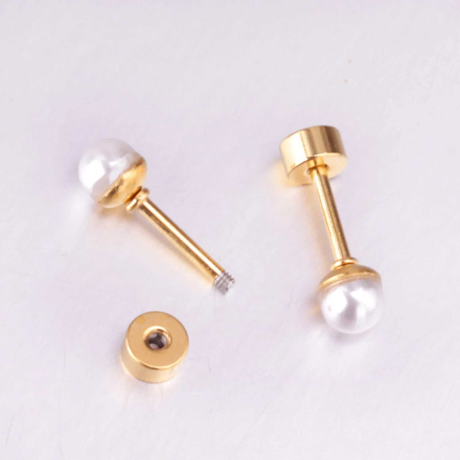 Stainless steel earrings 8mm white pearl screw stud earrings suitable for women girls mini 20G perforated sleepers fashionable Trags earrings W241023