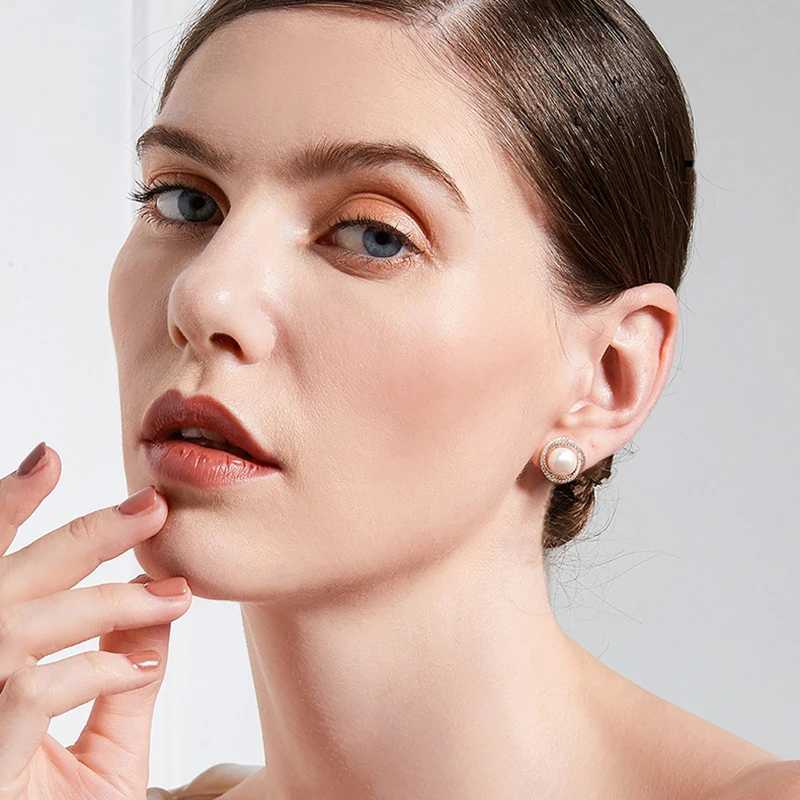 2020 Teruns unusual geometric vortex her pearls clipped onto earrings suitable for women no perforations fashionable jewelry party W241023