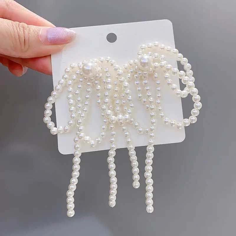 2024 Korean bow tassel earrings imitation pearl bead bow long earrings womens wedding fashion temperature jewelry gifts W241023