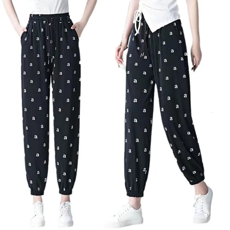 Korean womens summer patchwork elastic high waisted pocket printed letters fashionable loose fully matched casual harem pants 241023
