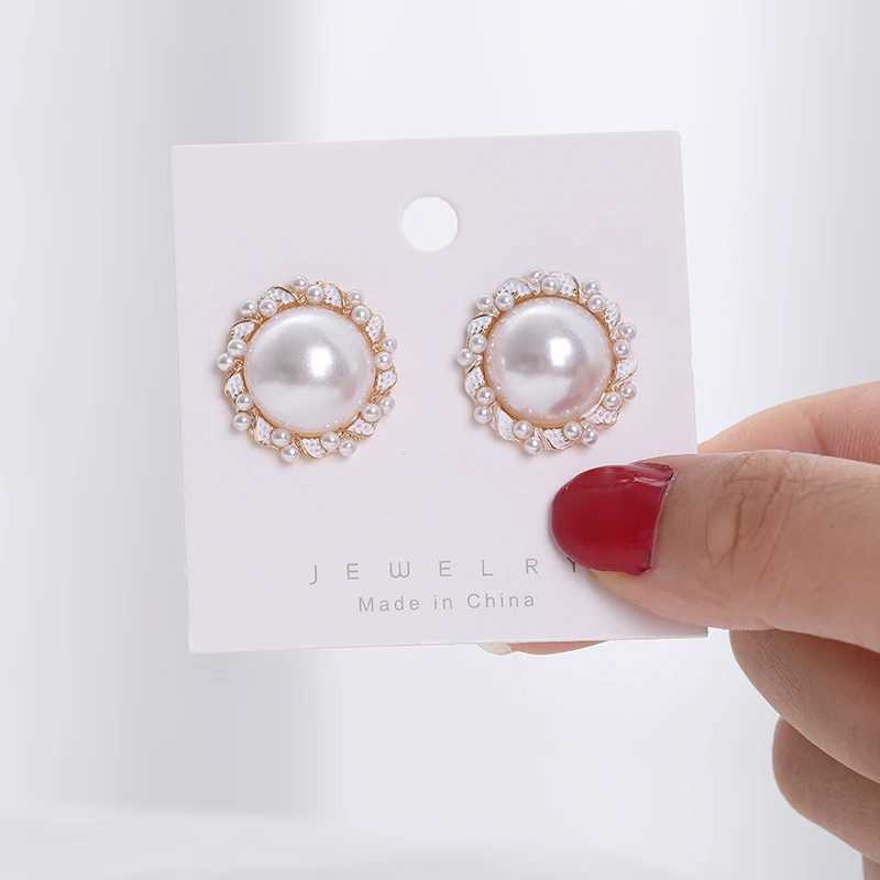 Imitation pearl gold silver round stud earrings suitable for women luxurious crystal earrings womens simulated pearl ring earrings W241023