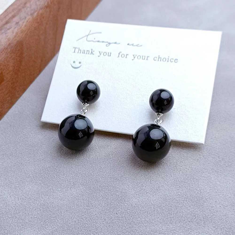 Elegant black and white imitation pearl pendant earrings suitable for women charming temperature big and small balls pendant party jewelry W241023