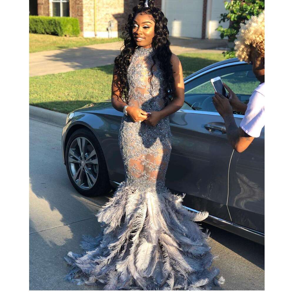 FATAPAESE Full Bodice Rhie Prom Dress V-Cut Necke Open Back with Lower Zipper Closure Feather Train MermaidGown