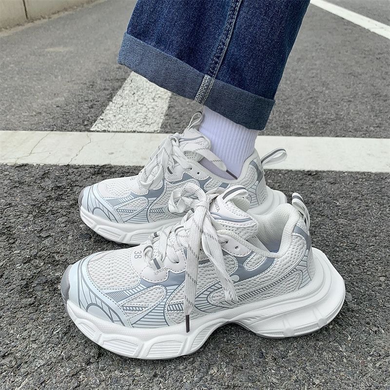 trendy street photo, thick soled couple, casual sports shoes, female