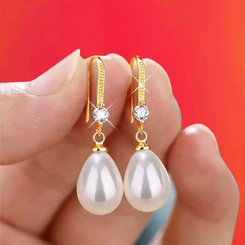 Simple and elegant droplet simulated pearl pendant earrings suitable for womens engagements weddings parties fashionable jewelry earrings gifts W24102
