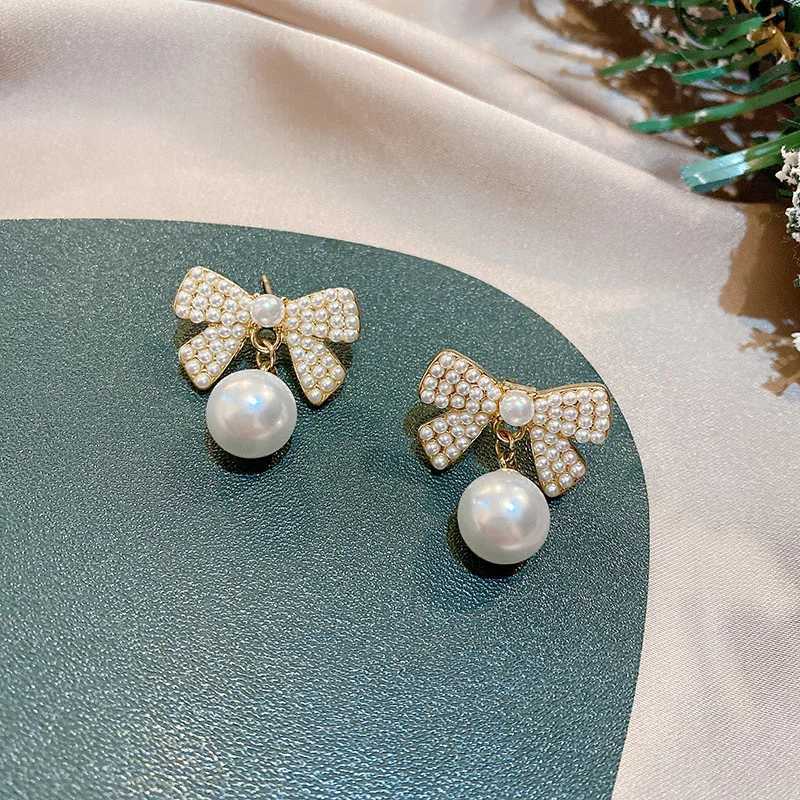 Sweet Girl Earrings Are Thin Pearl Bow Earrings Fashion New Temperament Net Red French Earrings Womens Clothing Sales OorbellenX241023