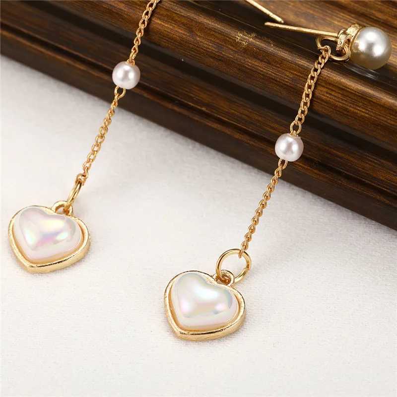 Mole 2024 New Fashion Long Pendant Heart Pearl Earrings Sweet Elegant Temperature Womens Pendant Earrings Jewelry Gifts W241023