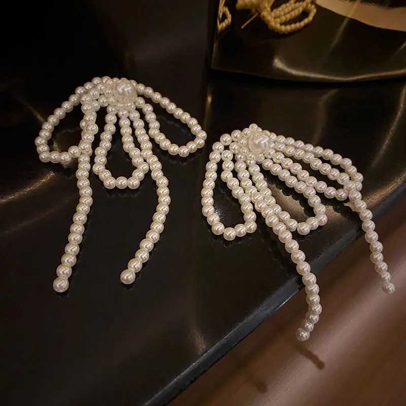 2024 Korean bow tassel earrings imitation pearl bead bow long earrings womens wedding fashion temperature jewelry gifts W241023