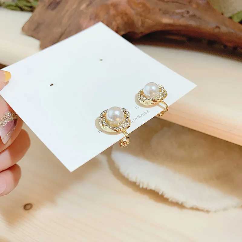 2020 Teruns unusual geometric vortex her pearls clipped onto earrings suitable for women no perforations fashionable jewelry party W241023