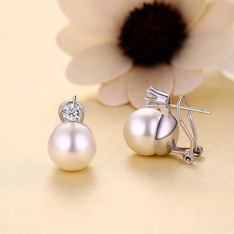 Huitan Tren Korean style perforated stud earrings for womens elegant simulated pearl jewelry used for engagement and sparkling CZ Accordies W241023