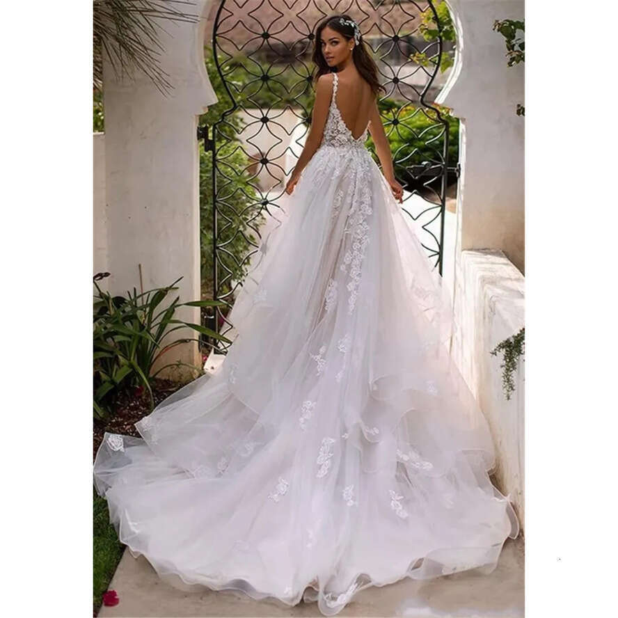 2021 Sexy Bohemian Country Beach A E Wedding Dresses Bridal Gowns Champagne Spaghetti Straps Keyhole Lace Appliques Tulle Ruffles Open Back Boho Garde