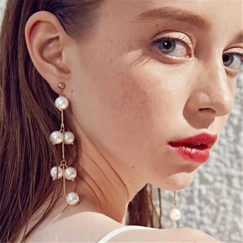 Mole 2024 New Fashion Long Pendant Heart Pearl Earrings Sweet Elegant Temperature Womens Pendant Earrings Jewelry Gifts W241023