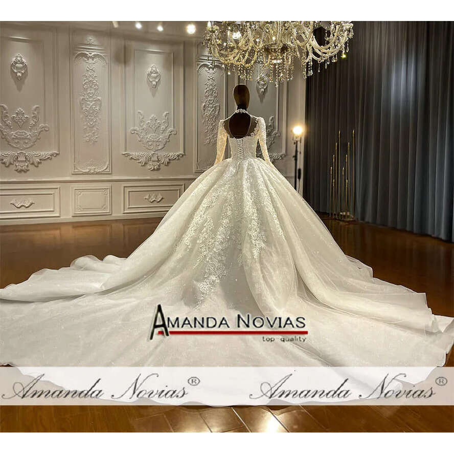 Long Sleeve Lace Appliqued Off White Wedding Dress