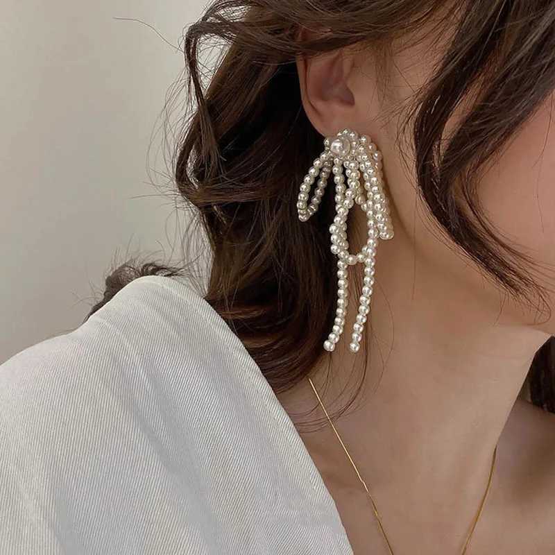 2024 Korean bow tassel earrings imitation pearl bead bow long earrings womens wedding fashion temperature jewelry gifts W241023