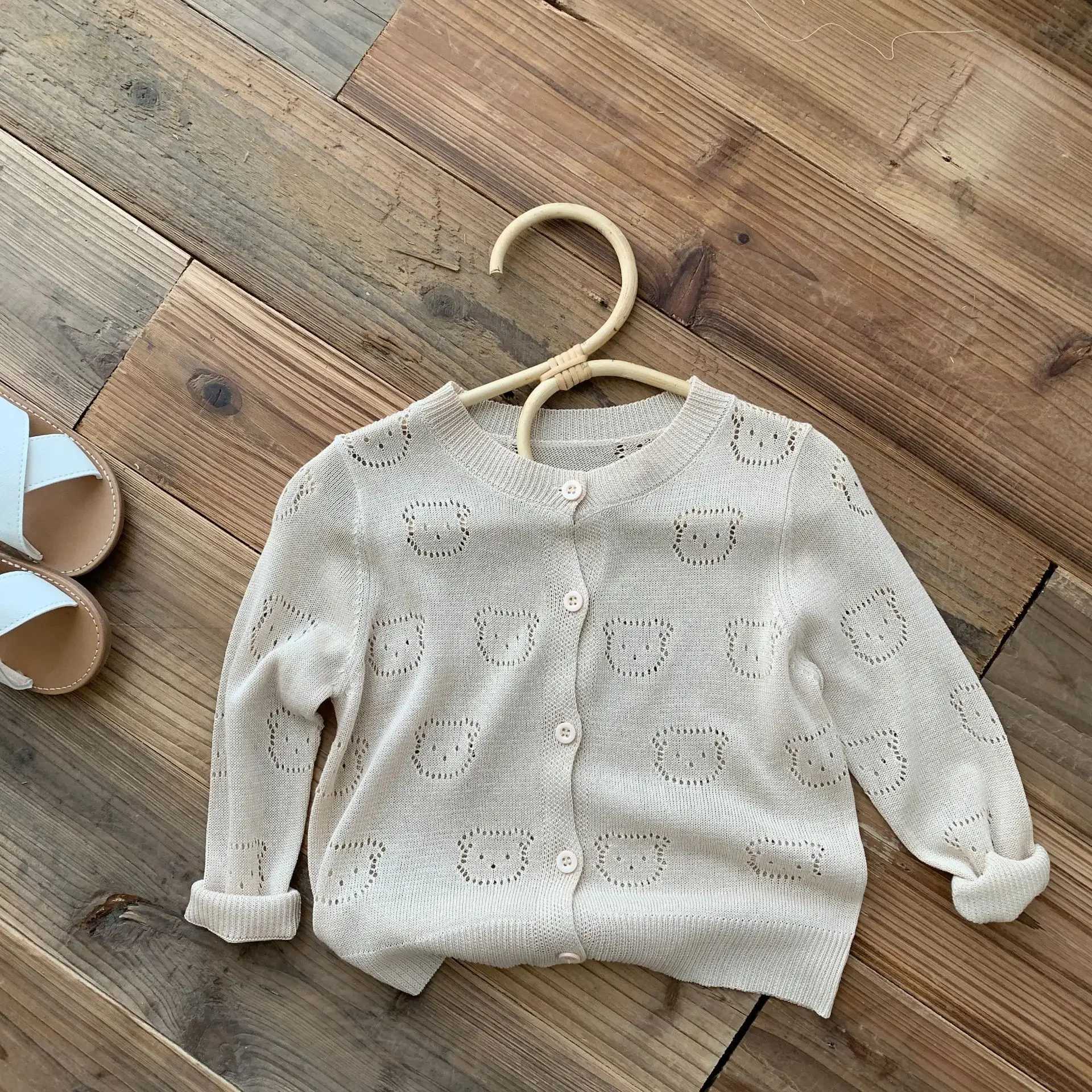 Simple and fashionable childrens air conditioning cardigan solid color knitted top hollow bear jacket childrens baby boy girl 0-6Y W241025