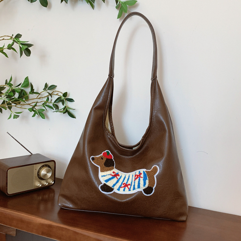 2025 Designer 2024 New Popular 3 Sausage Dog Autumn/Winter Shoulder Large Capacity Commuter Tote Bag for Women
