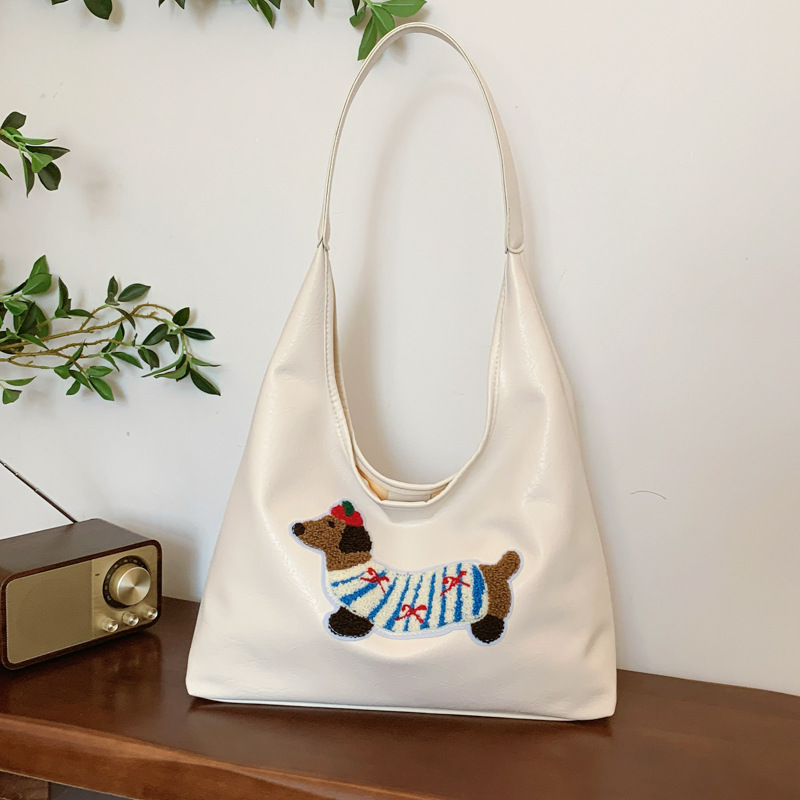 2025 Designer 2024 New Popular 3 Sausage Dog Autumn/Winter Shoulder Large Capacity Commuter Tote Bag for Women