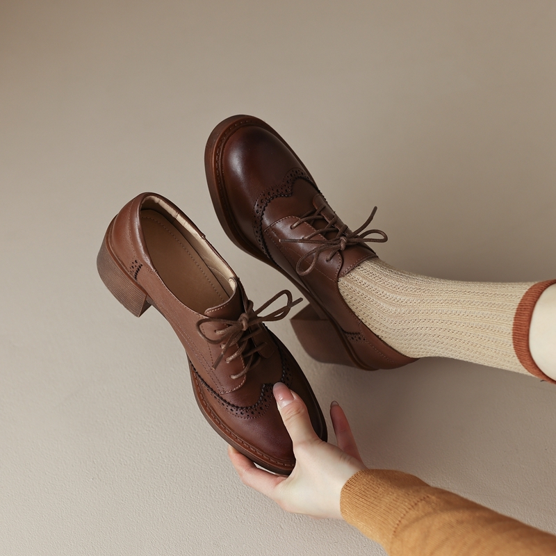 Women Install Large-Diameter Blocks On New Predictable Indoor And Outdoor Impact Steel Wheel Heads, Oxford Shoes