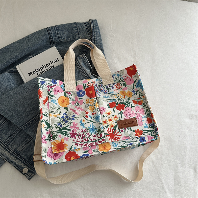 2025 Designer 2024 Autumn New 3 Small Fresh ral Canvas for Female Niche Single Shoulder Tote Bag Crossbody Commuter