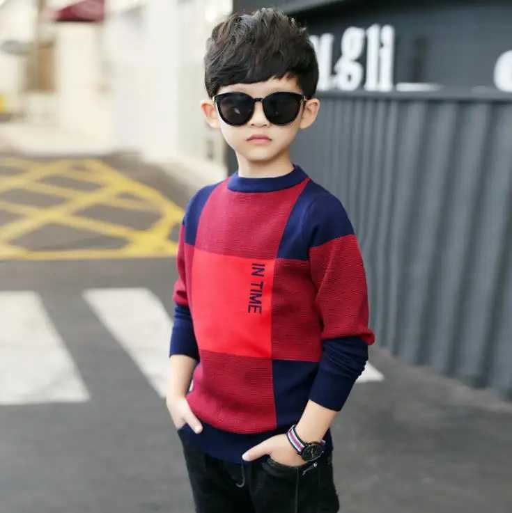 A boys round neck sweater a childs sweater. W241025
