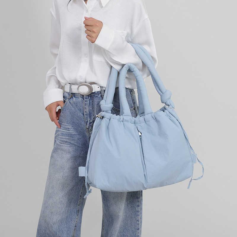 Trendy down cotton jacket bag, women's large capacity lightweight dual-use shoulder bag, hand-held backpack, niche crossbody bag 241015