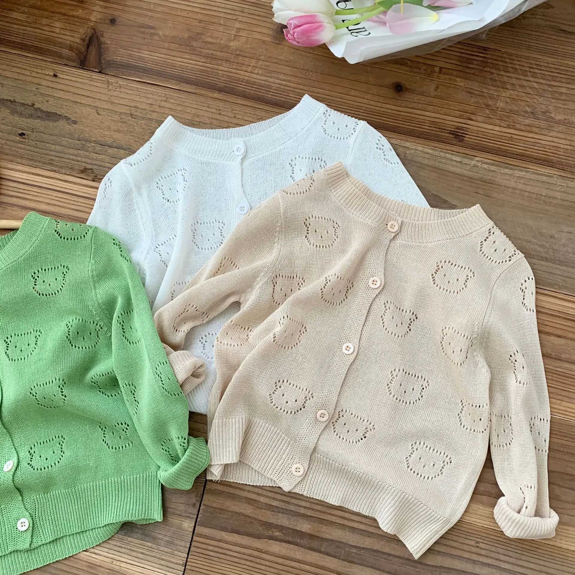 Simple and fashionable childrens air conditioning cardigan solid color knitted top hollow bear jacket childrens baby boy girl 0-6Y W241025