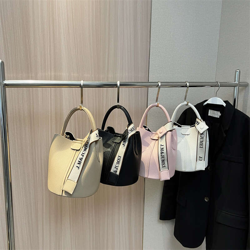 This year's popular small 2024 spring/summer new women's niche design crossbody hand-held bucket bag