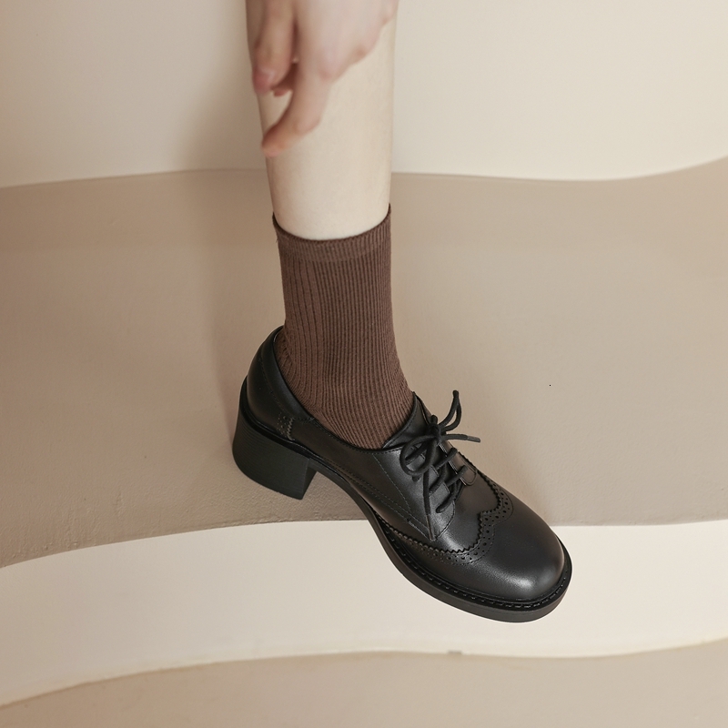 Women Install Large-Diameter Blocks On New Predictable Indoor And Outdoor Impact Steel Wheel Heads, Oxford Shoes