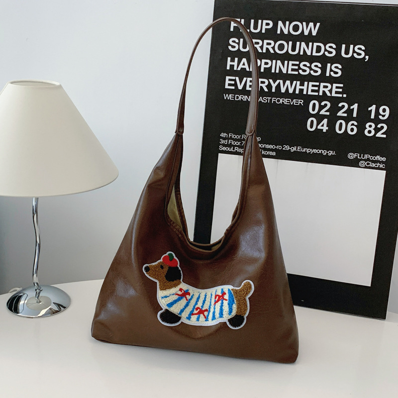 2025 Designer 2024 New Popular 3 Sausage Dog Autumn/Winter Shoulder Large Capacity Commuter Tote Bag for Women