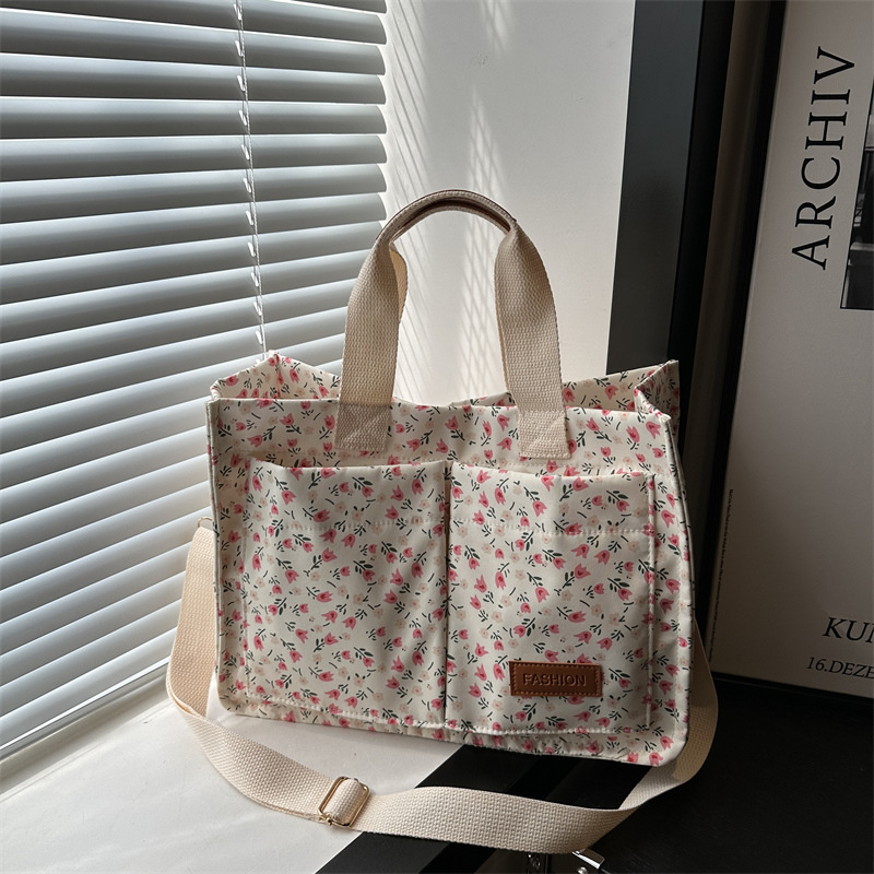 2025 Designer 2024 Autumn New 3 Small Fresh ral Canvas for Female Niche Single Shoulder Tote Bag Crossbody Commuter