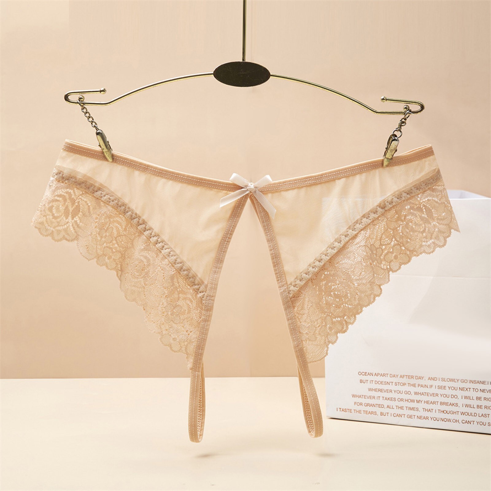 2025 New designer s sexy and breathable lace hollowed out raised Butoc short trend mesh thong for women