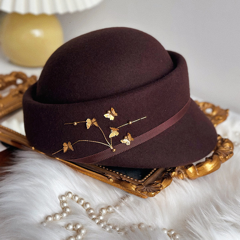 equestrian autumn winter hat metal butterfly flower fashionable and concave top duckbill woolen hat