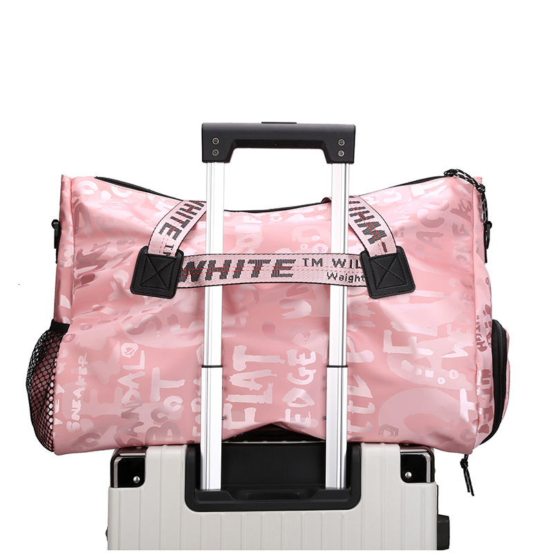 2025 New traveling bag designer women s travel portable nylon sportswear storage multifunctional dry Backpack wet separation carnival bag fashionable