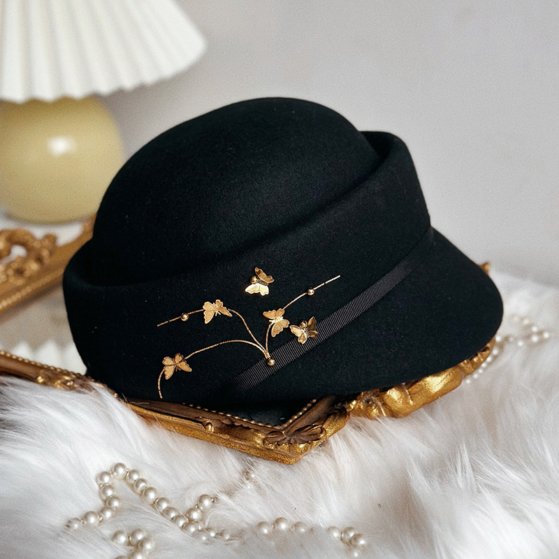 equestrian autumn winter hat metal butterfly flower fashionable and concave top duckbill woolen hat