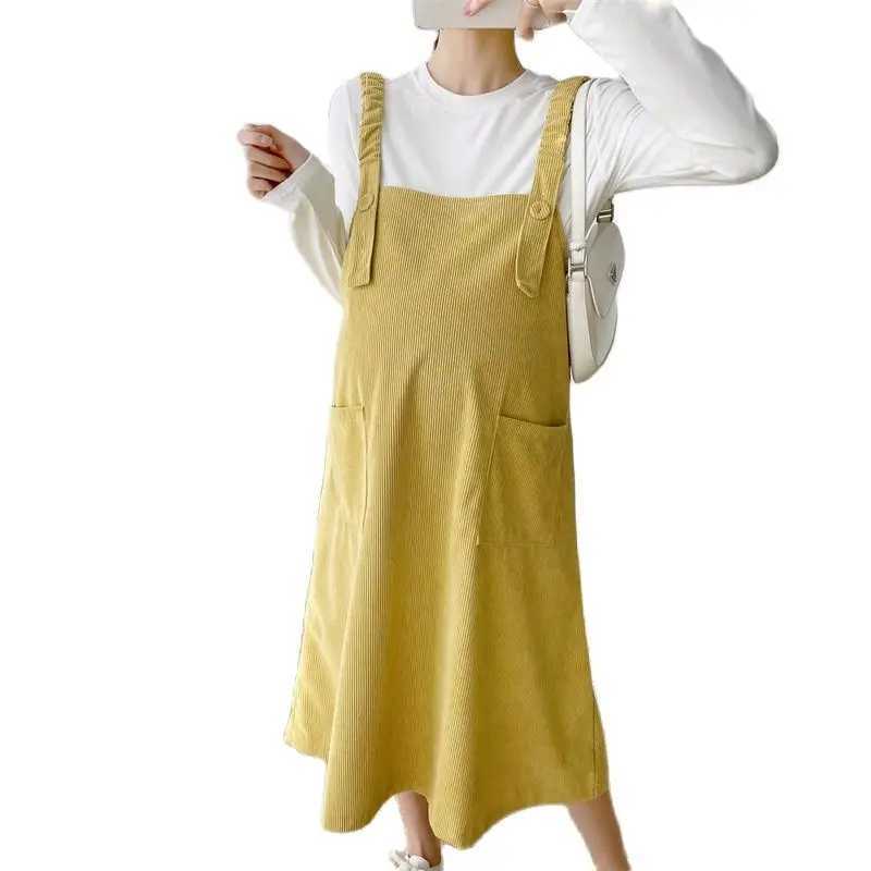 Cotton Corduroy shoulder strap dress with loose knee length and pockets fashionable new winter autumn maternity dress W241026