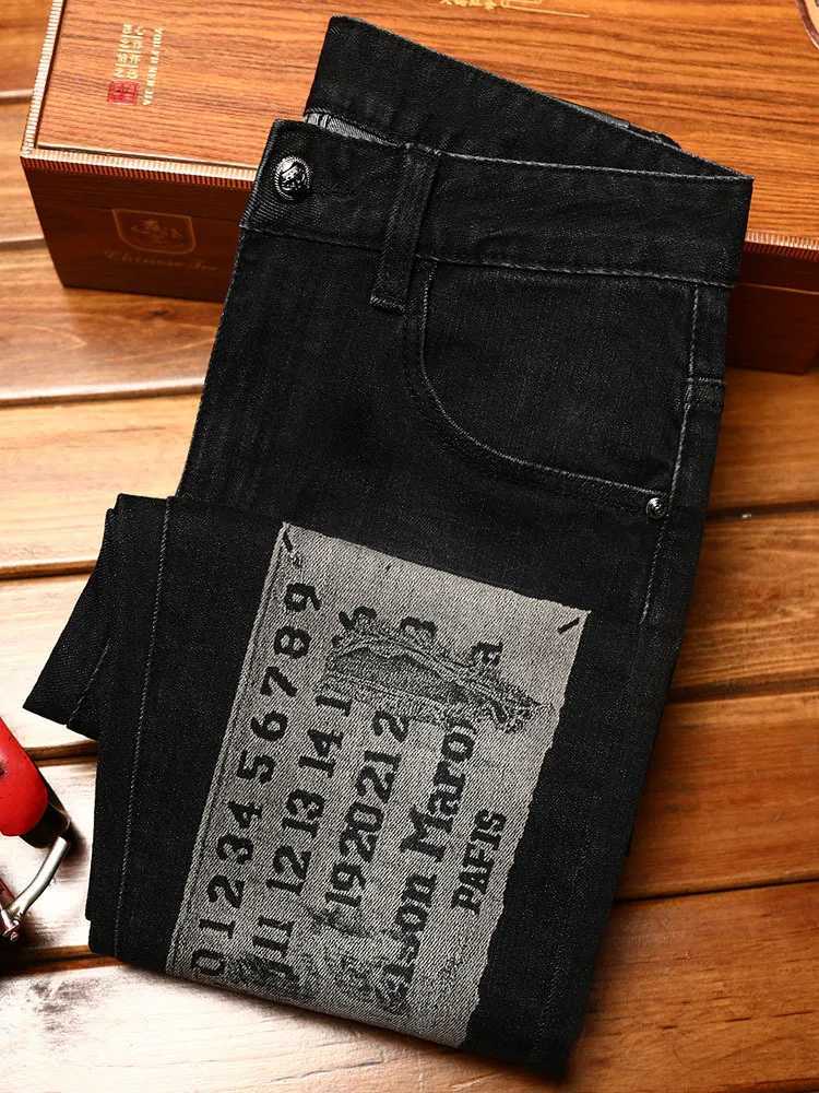 High-end trendy printed jeans for men with elastic slim fit and small feet personalized Korean version of youth casual denim. X250812