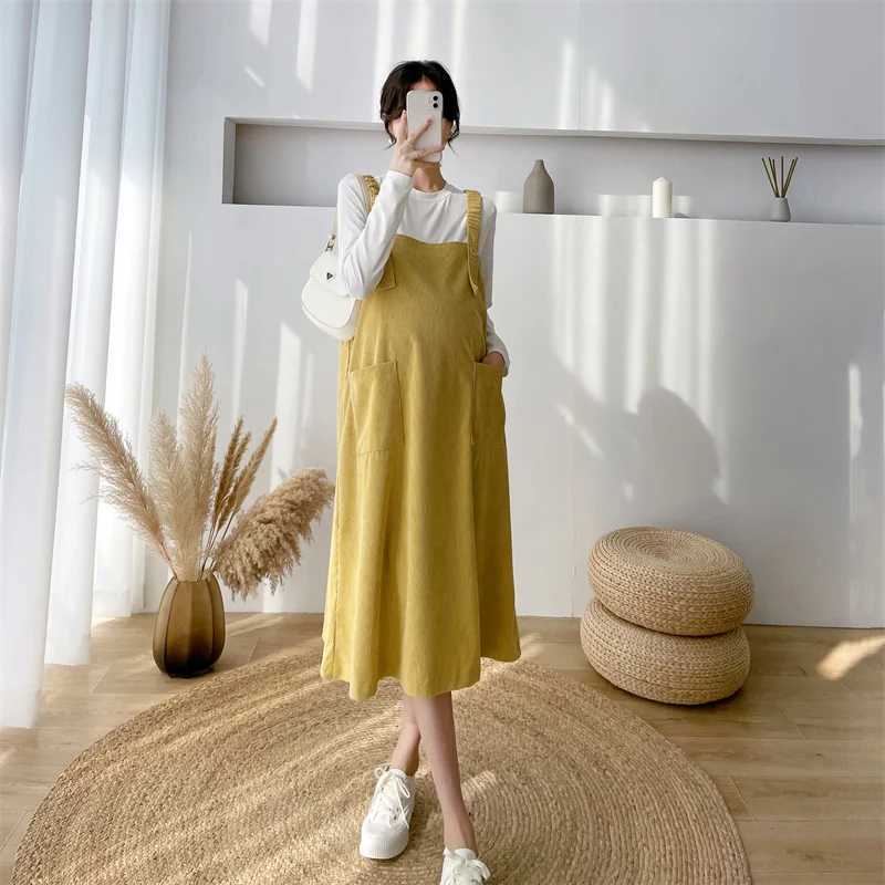 Cotton Corduroy shoulder strap dress with loose knee length and pockets fashionable new winter autumn maternity dress W241026