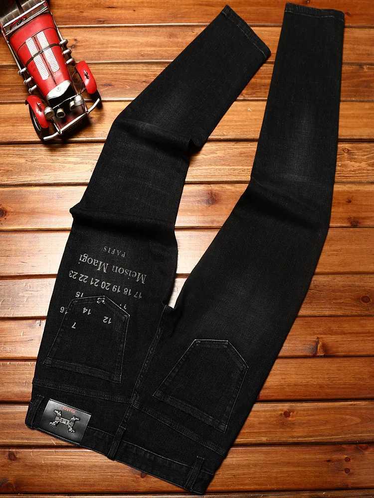 High-end trendy printed jeans for men with elastic slim fit and small feet personalized Korean version of youth casual denim. X250812