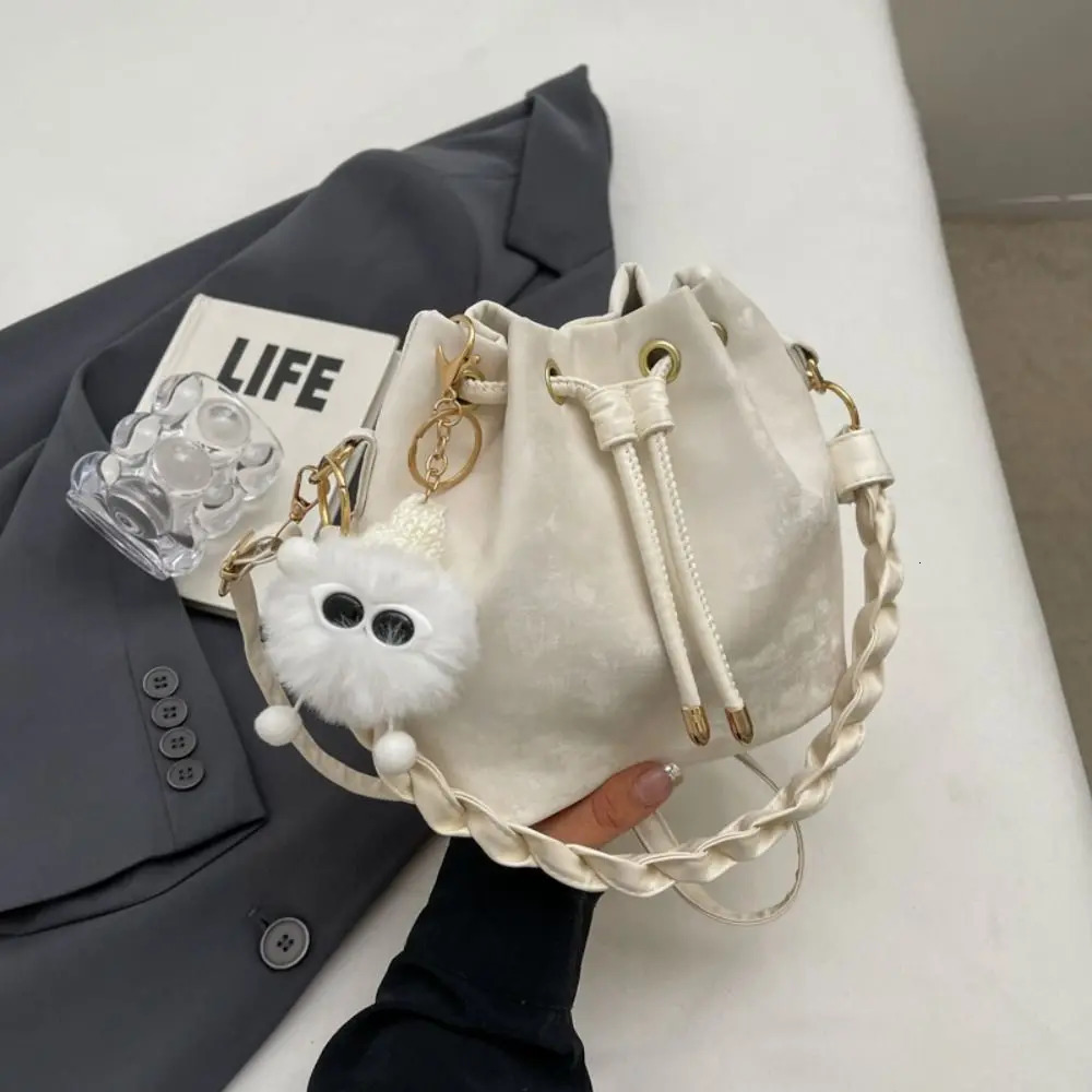 Plush pendant bucket bag PU polyester brushed tie handbag Japanese and Korean style armrest bag daily matching 241025