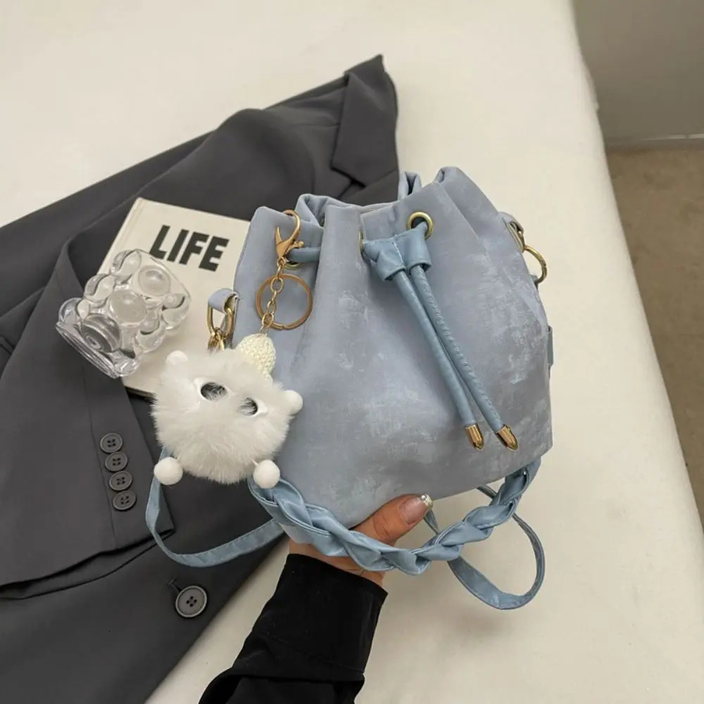 Plush pendant bucket bag PU polyester brushed tie handbag Japanese and Korean style armrest bag daily matching 241025