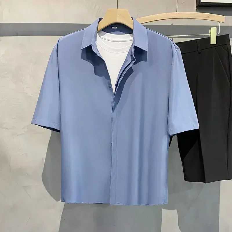 Summer mens wrinkle resistant solid color short sleeved shirt office casual loose button pocket fashionable shirt mens clothing top W241026