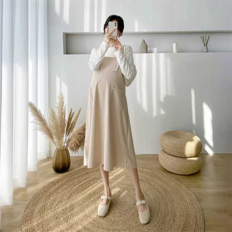 Cotton Corduroy shoulder strap dress with loose knee length and pockets fashionable new winter autumn maternity dress W241026