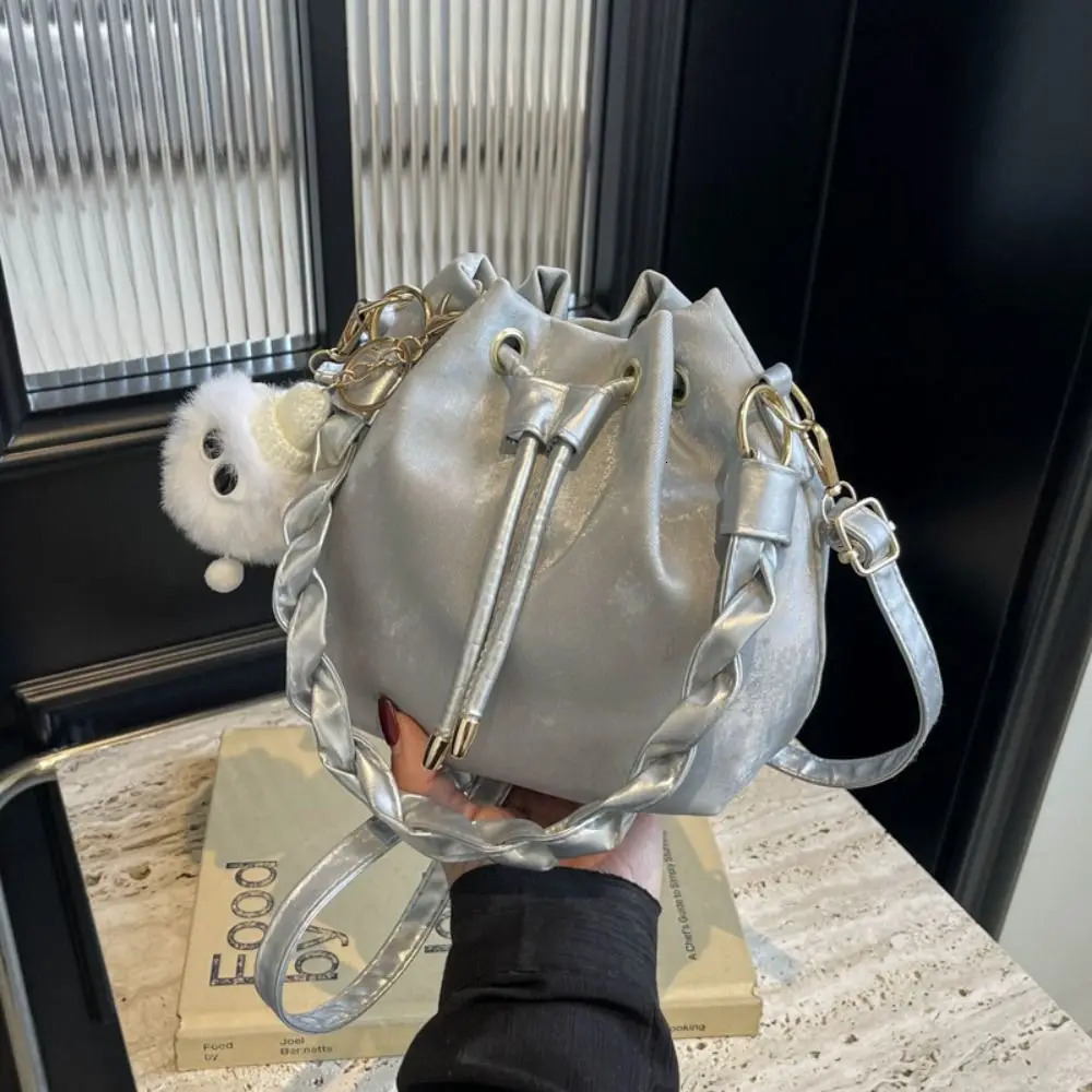 Plush pendant bucket bag PU polyester brushed tie handbag Japanese and Korean style armrest bag daily matching 241025