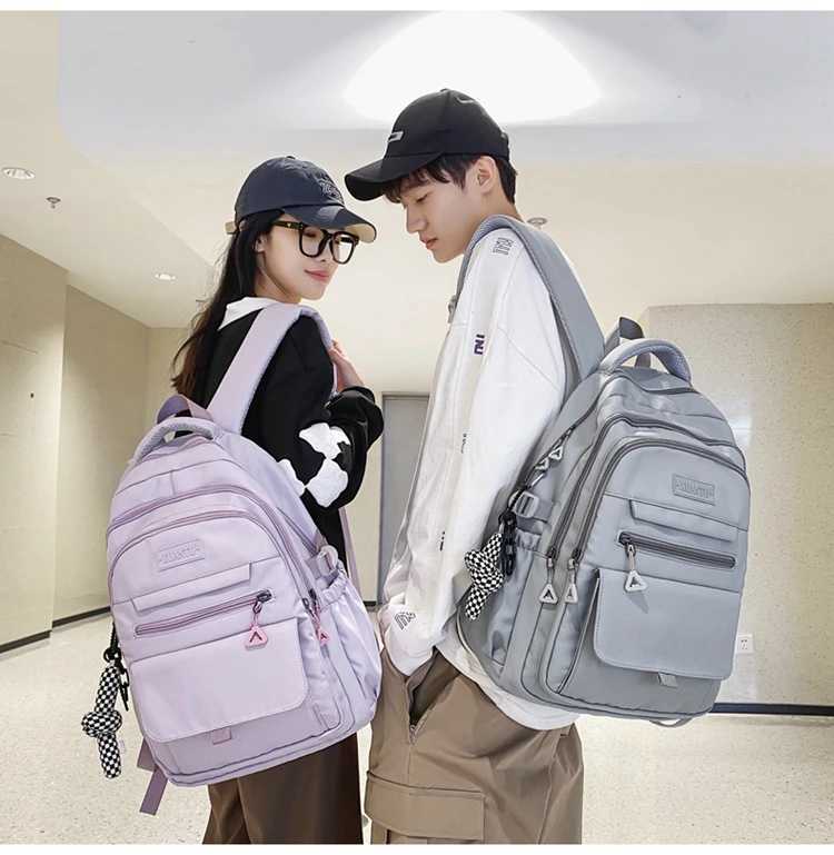 2023 Simple student bag solid color schoolbag youth large capacity travel backpack High quality canvas schoolbag fashion bagXJ241026