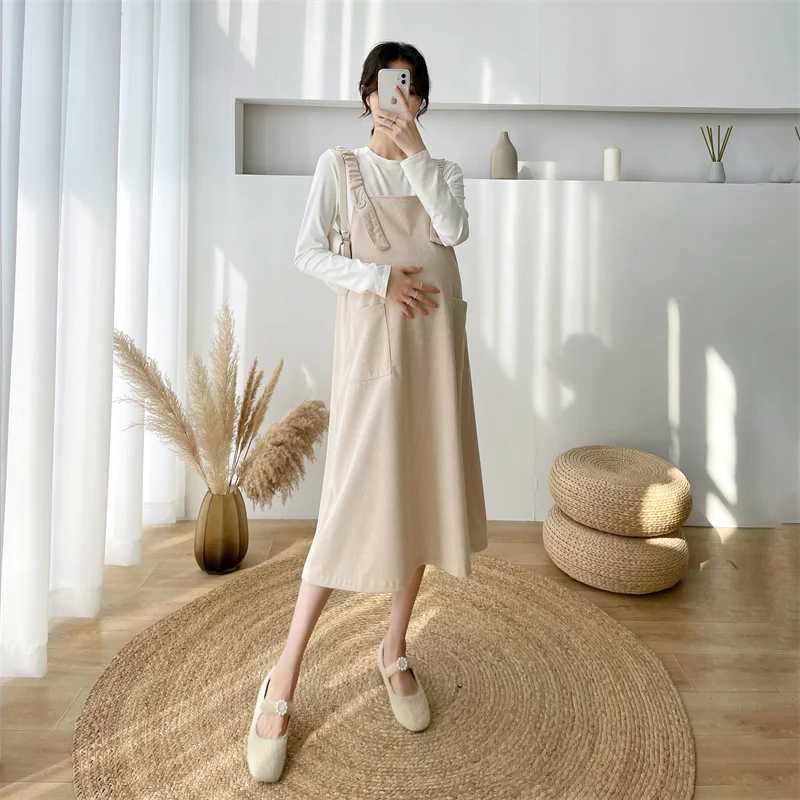 Cotton Corduroy shoulder strap dress with loose knee length and pockets fashionable new winter autumn maternity dress W241026