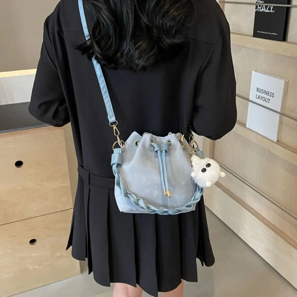 Plush pendant bucket bag PU polyester brushed tie handbag Japanese and Korean style armrest bag daily matching 241025