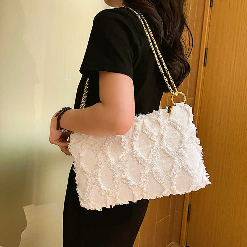 CMM Denim Bag Fashion Tassel Personality Womens Large Capacity Single Shoulder Chain Envelope Bag Trend